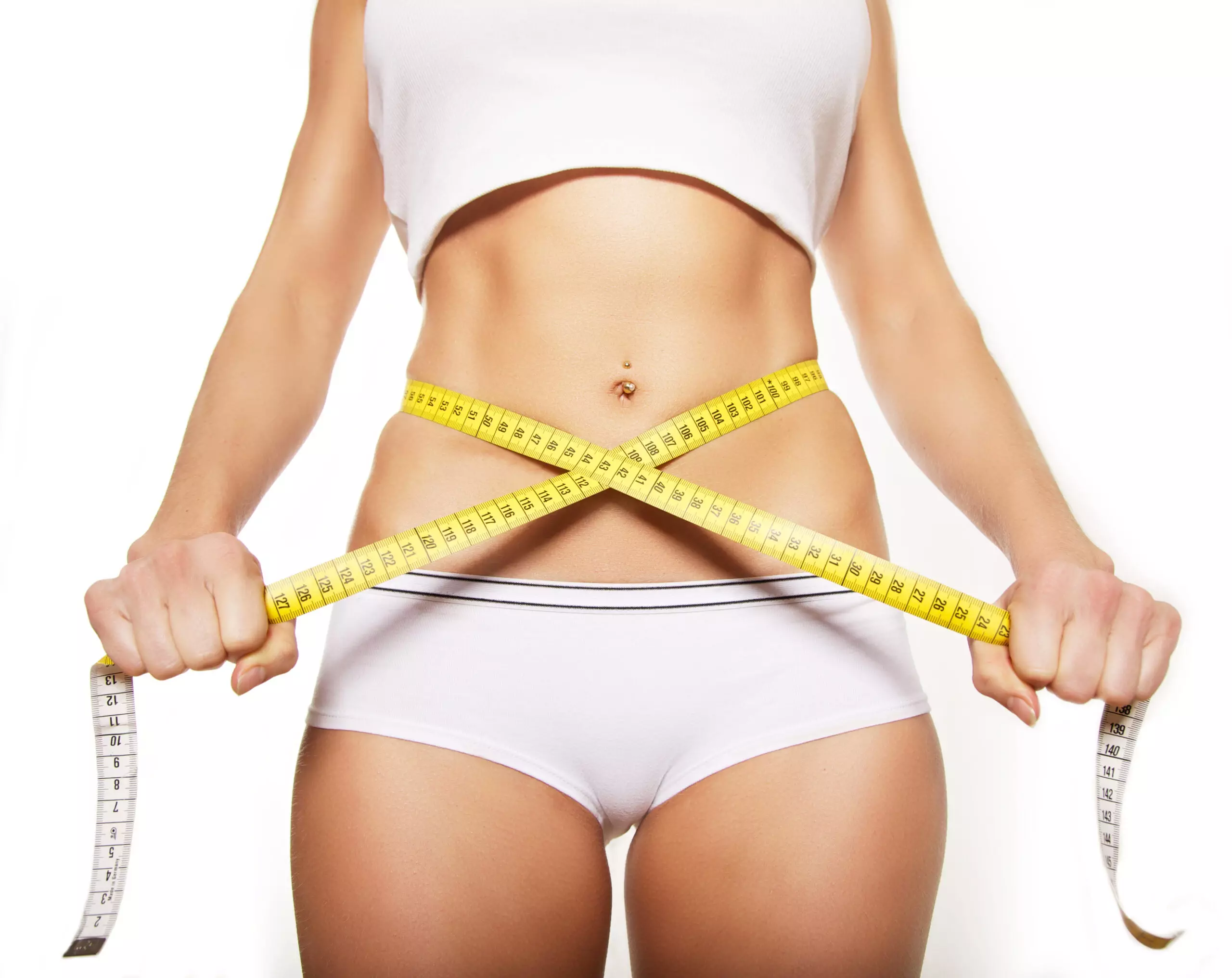 Woman measuring waist fitness concept.