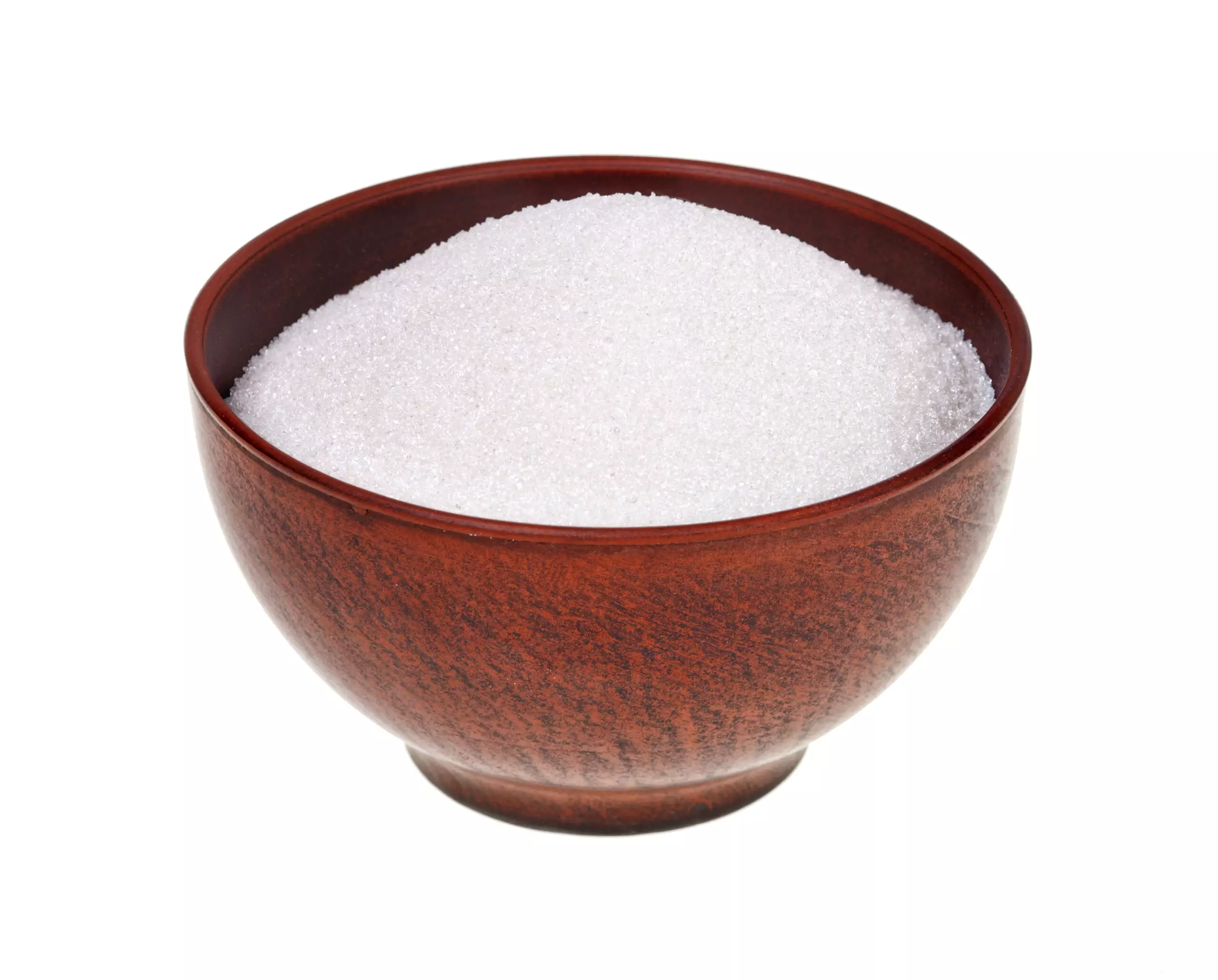 Brown bowl filled with white sugar.